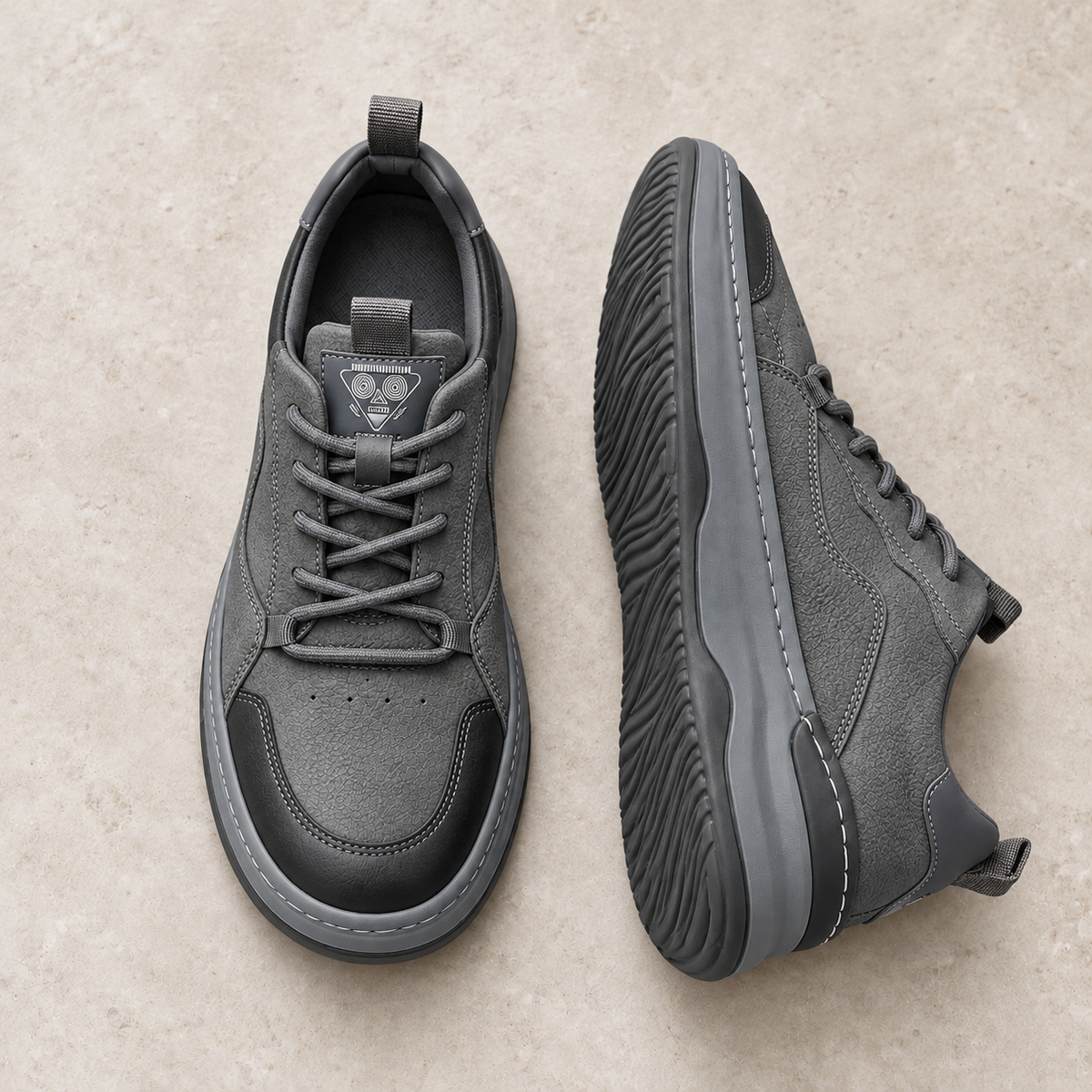 Alpine Ridge Boulder Gray footwear on warm limestone, paired with side and outsole visible