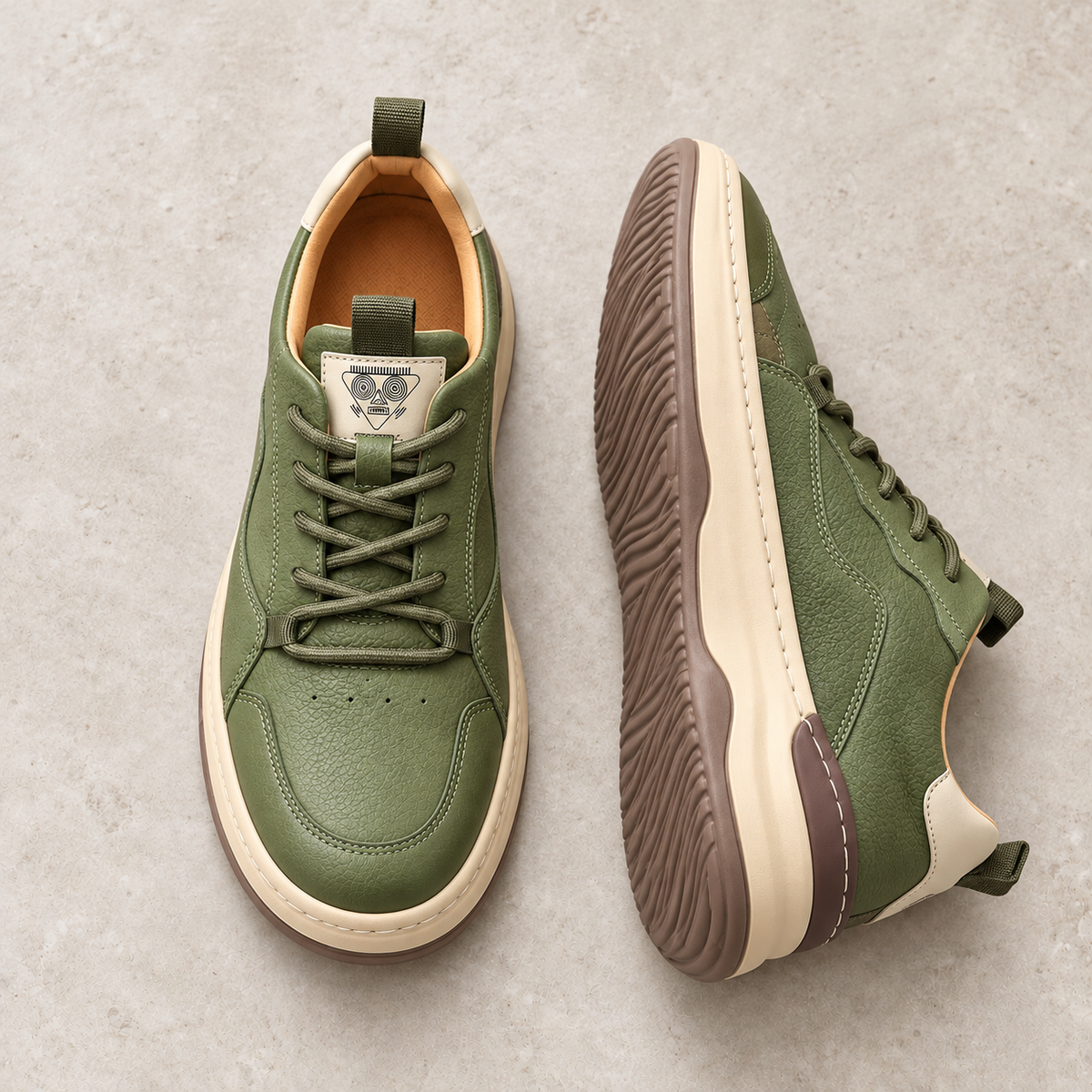 Alpine Ridge Boulder Green footwear on warm limestone, paired with side and outsole visible